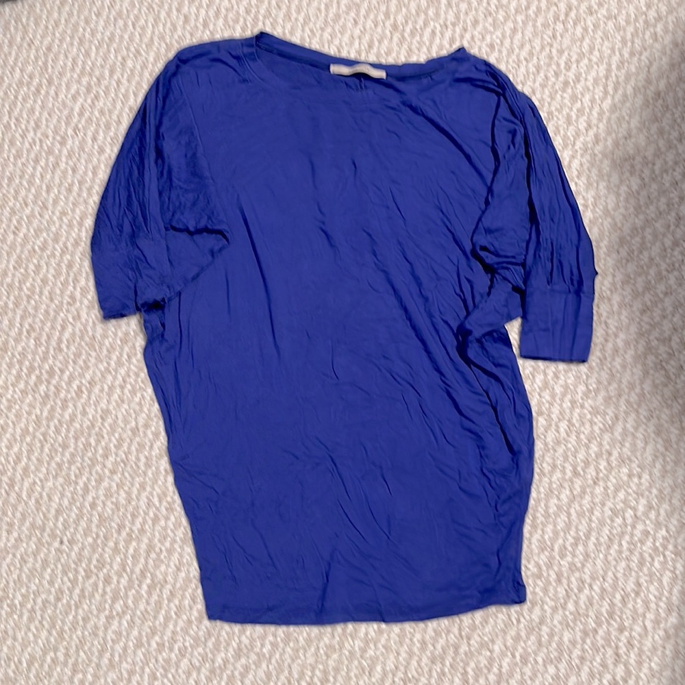 Big and oversized blue top